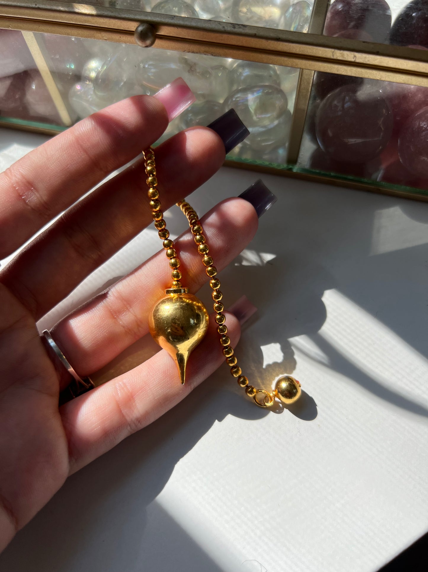 Gold Pointed Sphere Pendulum