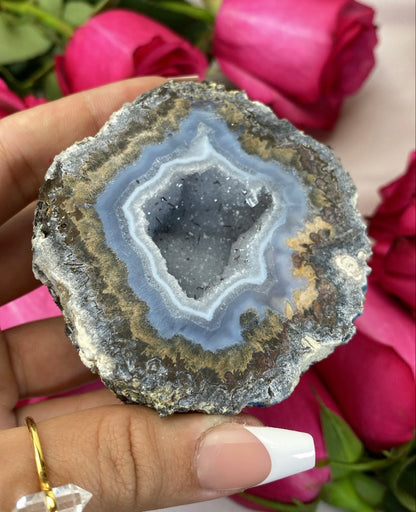 Mexican Blue Calcite Geode with Hematite inclusions